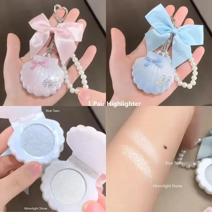 Fleur de corolle pâle sait petit ange Collection soulagement surbrillance poudre pour le visage ilum