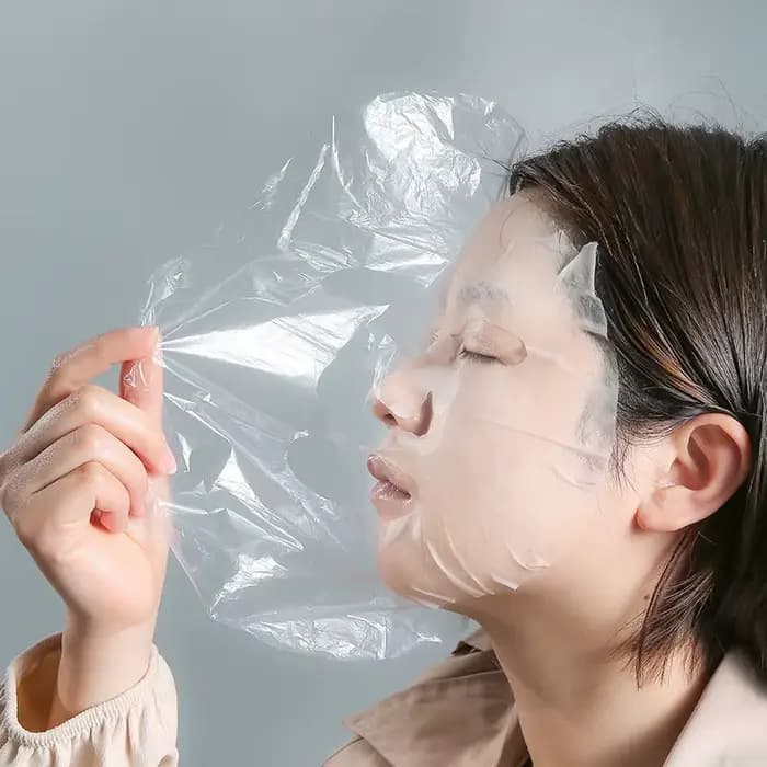 Masque de nettoyage complet du visage en film plastique de poulet, masques PE transparents en papier