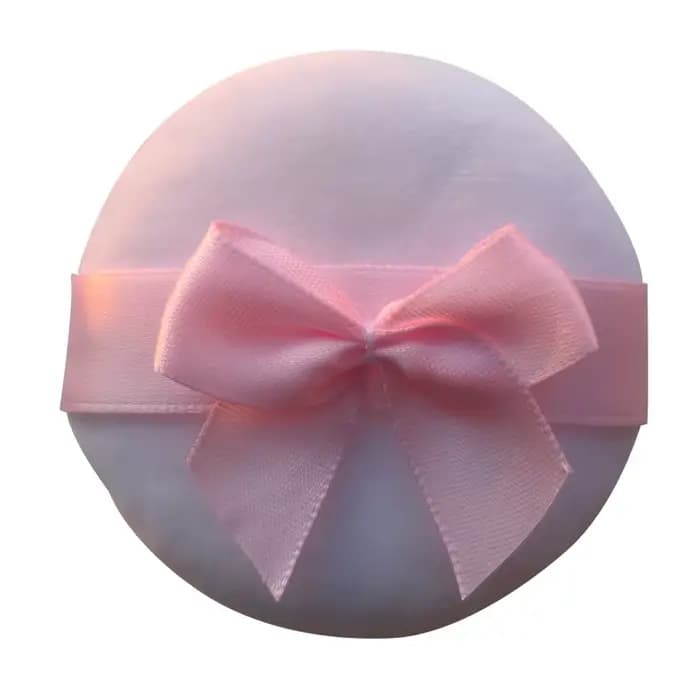 Houppettes de maquillage roses et blanches