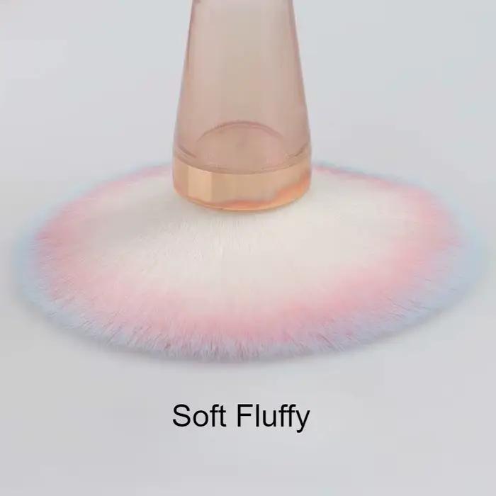 Brosse de maquillage rose irisée