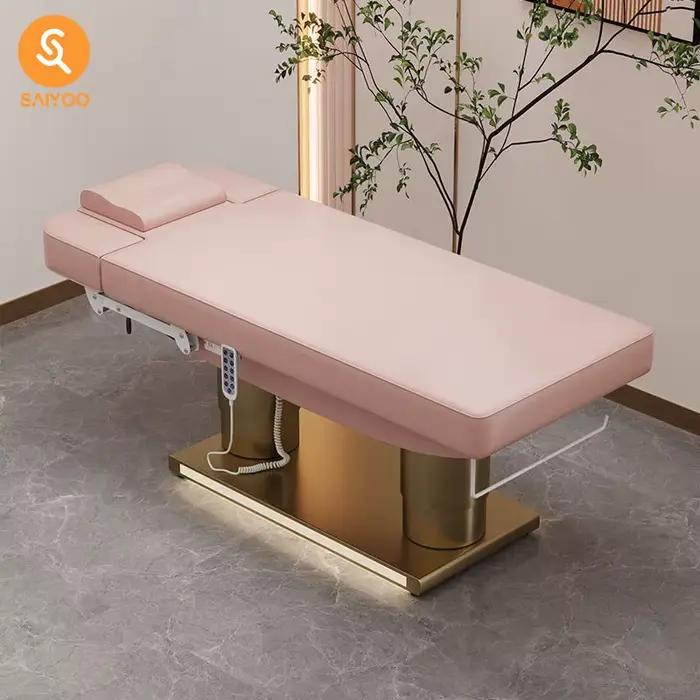 Lit de massage de beauté en cuir rose à 4 moteurs de luxe avec base en acier inoxydable à double cylindre