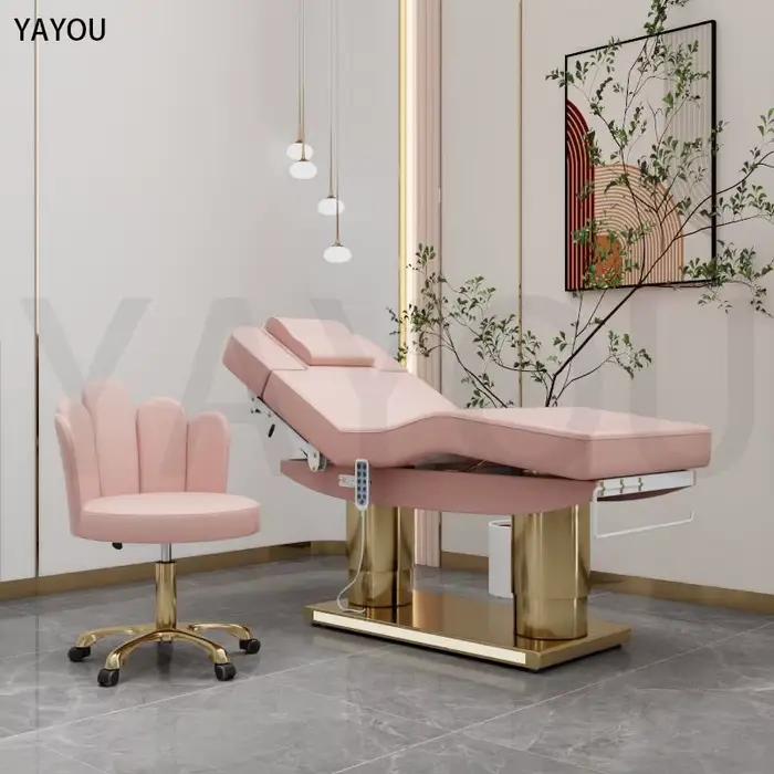 Lit de massage de beauté en cuir rose à 4 moteurs de luxe avec base en acier inoxydable à double cyl
