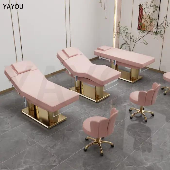 Lit de massage de beauté en cuir rose à 4 moteurs de luxe avec base en acier inoxydable à double cylindre