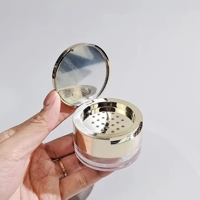 Boîte à poudre portable avec tamis miroir