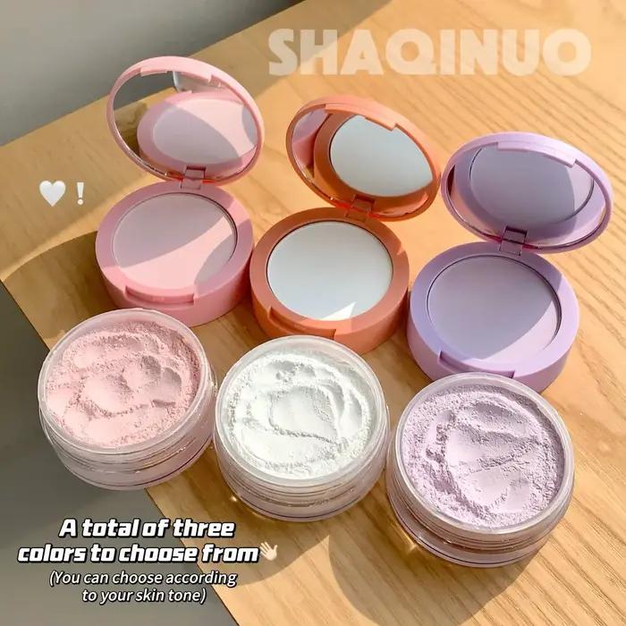 Poudre compacte légère et transparente à double effet