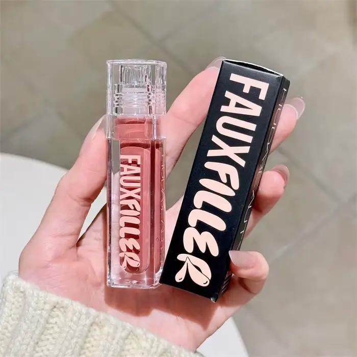 Huda Beauty Faux remplissage brillant Non collant brillant à lèvres hydratant cristal clair huile pour les lèvres repulpant hydratant teinté rouge à lèvres maquillage