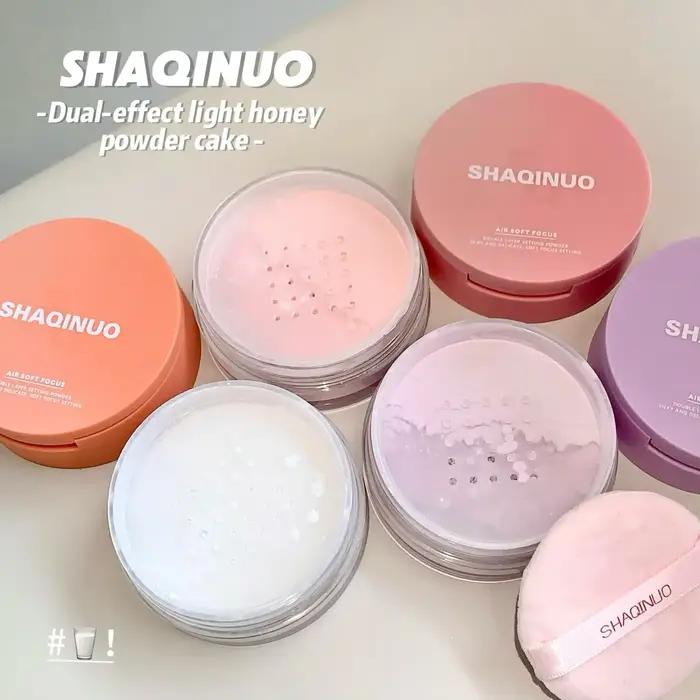 Poudre compacte légère et transparente à double effet