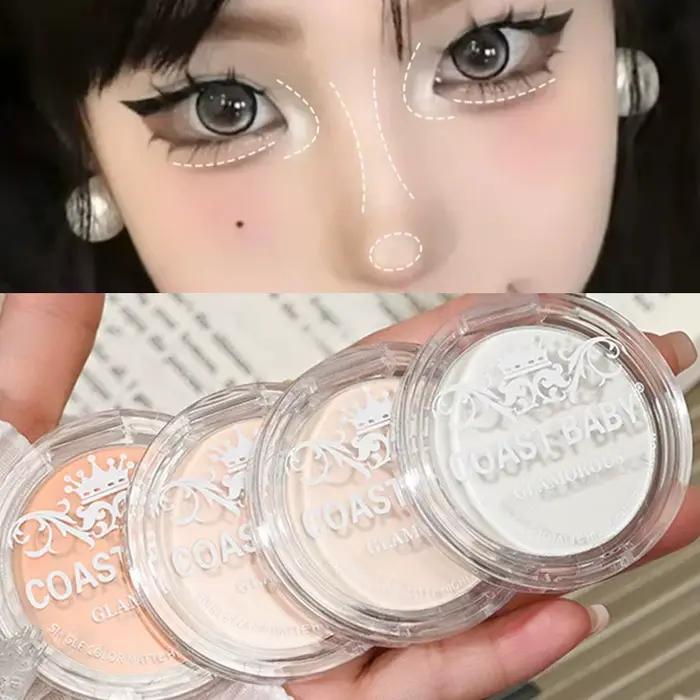 Palette de poudre illuminatrice beige et blanche