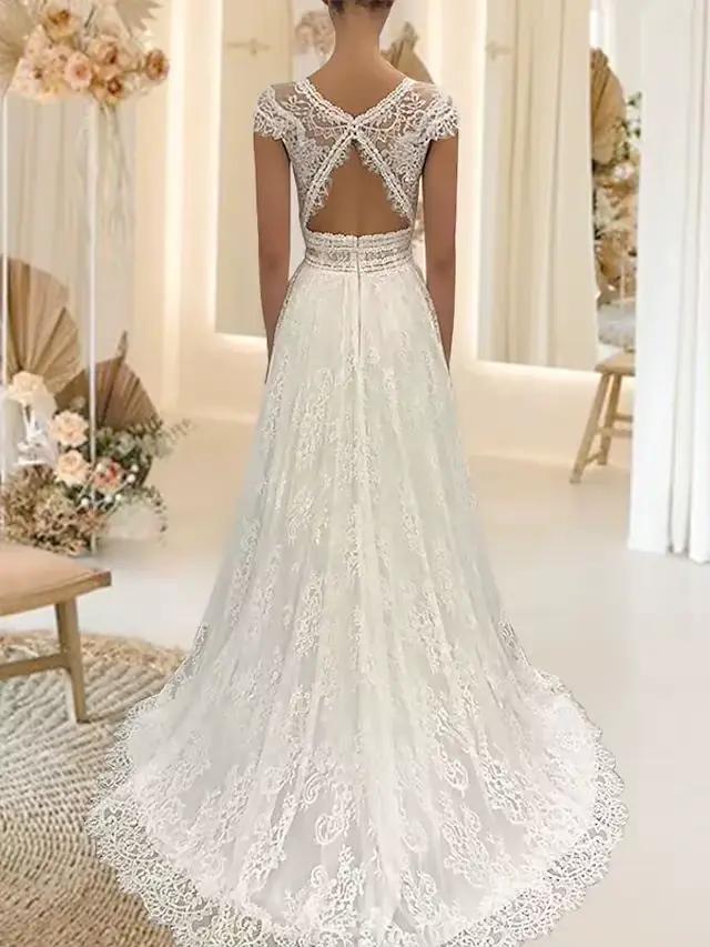 Robe de mariée blanche, col en V profond, traîne balai, en dentelle, sans manches, dos illusion sexy, longueur ras du sol, coupe trapèze